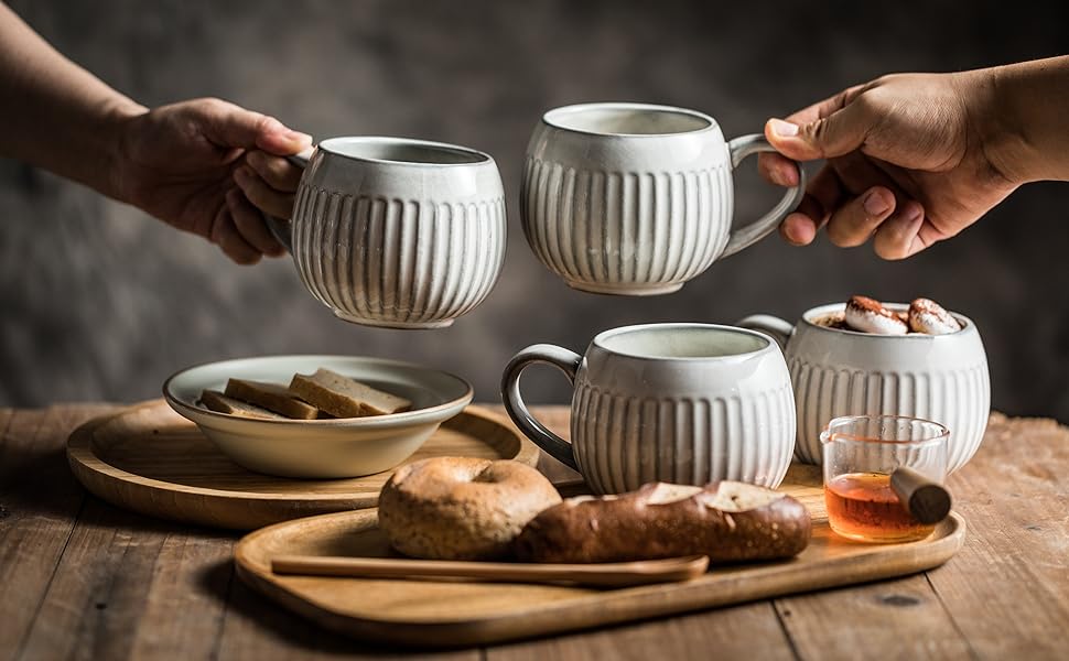 white cups of coffee on a table