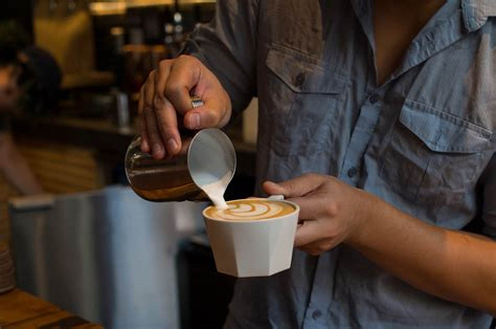 a host preparing to serve coffee