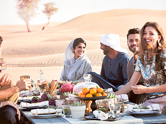 tourists having dinner in the UAE - dubai